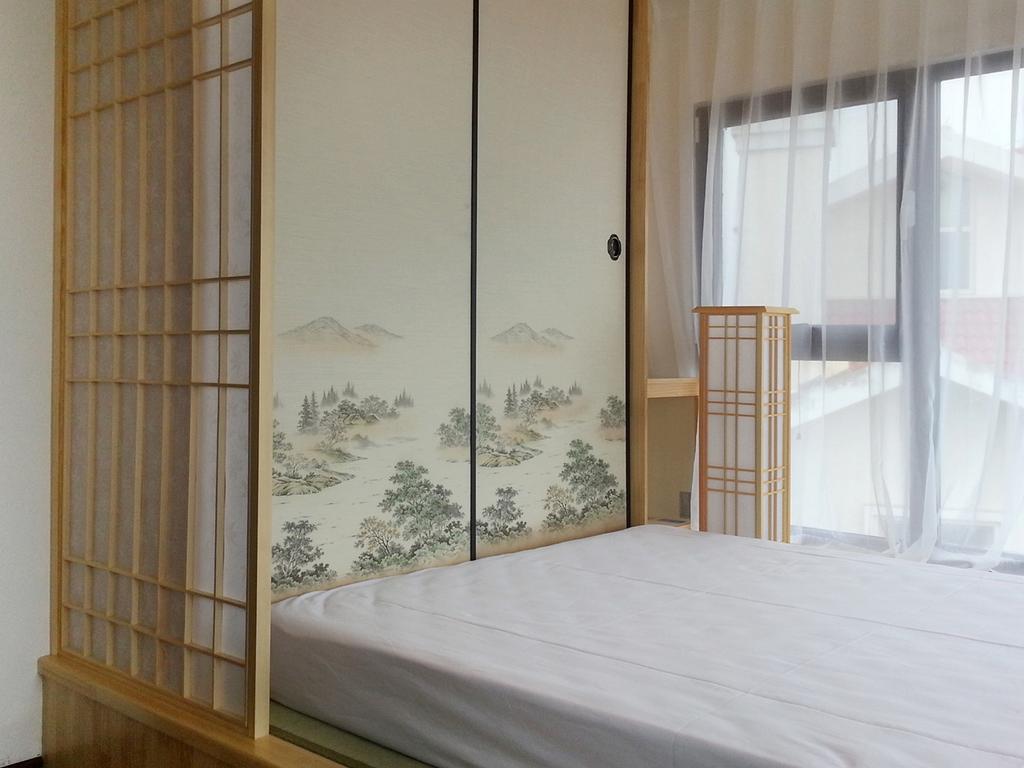 Villa Inn No.21 Seaside Qingdao Kamer foto